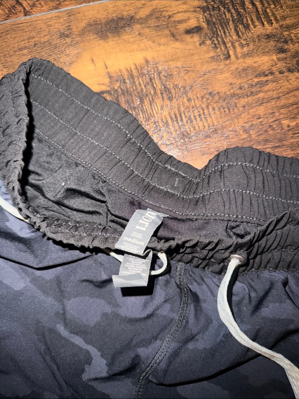 Vuori Women's Navy Camo Athletic Shorts with Black Waistband - Picture 2 of 3